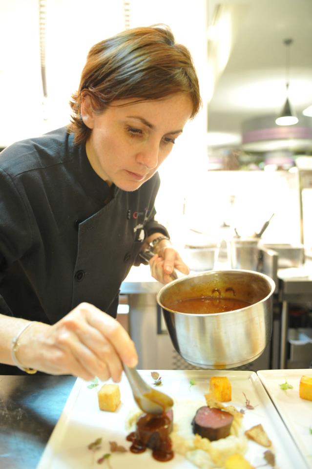 Chef Nathalie hard at work preparing the main course. She later came out of the kitchen after dinner to a huge applause by the guests who really appreciated her effort!