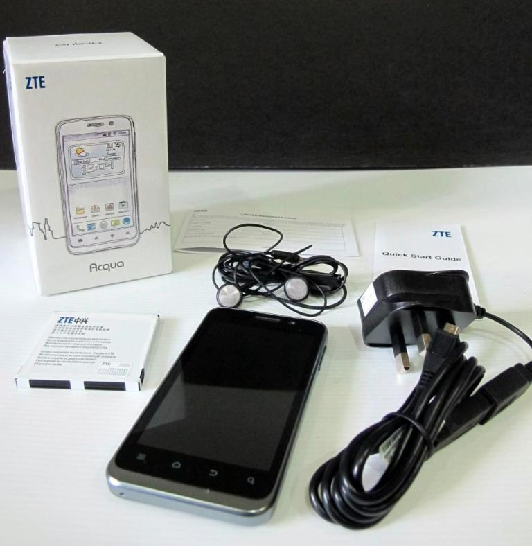 What's inside the box - phone (duh!), battery, USB cable, charger, headphones, warranty and quick start guide