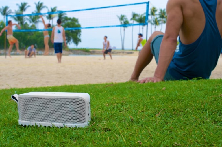 Take it outdoors! It's powerful enough that you can still hear the music clearly up to 10 feet away (speakers facing you of course)