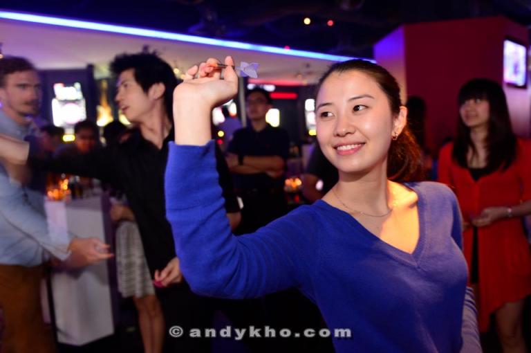 Even girls play darts!