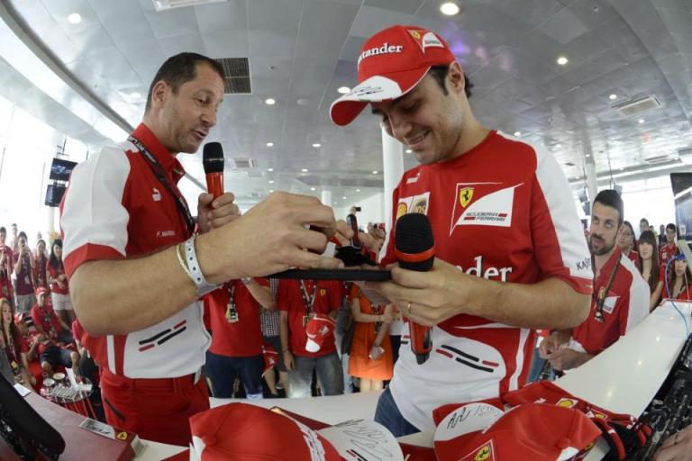 He even autographed some merchandise which would be given out through the games later that afternoon