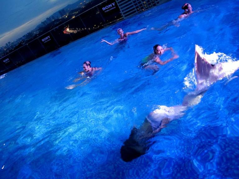 The synchronized swimmers were joined by the 2 male models and 2 mermaids (and yes all were wearing the Sony Walkman W273).