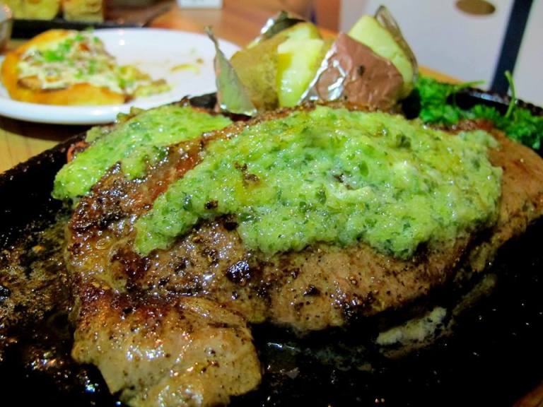 Sizzling steak - ok we made a critical error of not tucking into this one when it was served and letting it sit on the hot plate. As a result the meat became well done so unless you're a fan of well done steaks I suggest you remove the steak from the sizzling hot plate immediately when it's served or ask the kitchen to ensure it's cooked rare. Although it was well done we still finished it as it went really well with the garlic sauce. This came with a baked potato on the side.