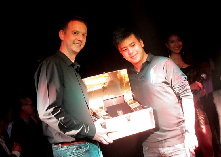 And the lucky winner of the gold bar was Owen Ting