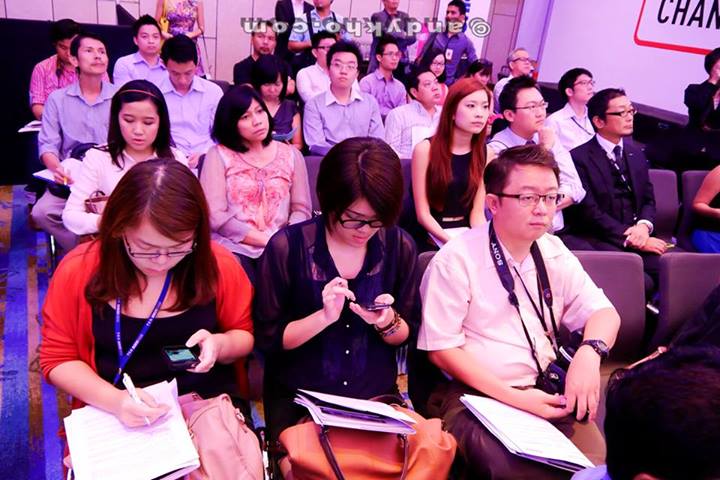 Andy then flipped the free-angle 3.0 inch touch screen, turned the camera upside down and snapped a pic of the media seated behind him while looking front.