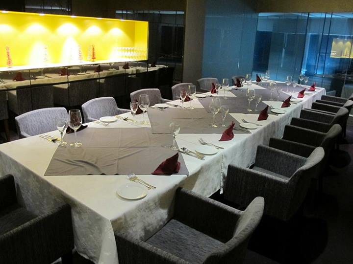 The larger private room upstairs can fit up to a dozen guests