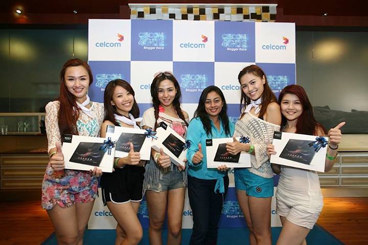 The White Team all smiles after receiving their tablets from Celcom First.
