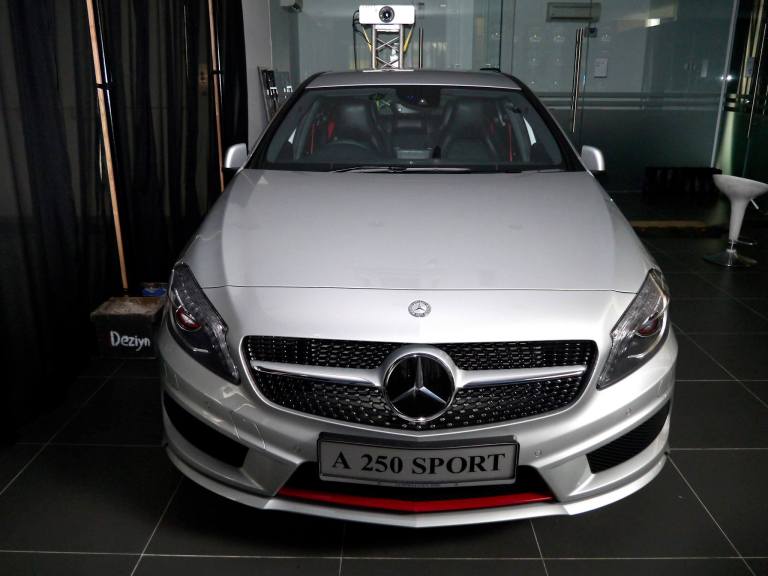 i headed upstairs and I noticed the A250 Sport hidden behind some black curtains. It was supposed to be unveilled during the party at night which unfortunately I could not attend as I was already booked. Anyway I took the opportunity to snap a photo of this sexy beast. The A250 Sport's engine puts out 211hp and 350 Nm of torque and retails at RM238,888.00 OTR.