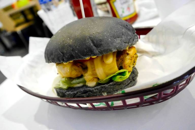 The most basic burger - I am Single - consisting of a beef/ chicken pattie with cheese in a black bun. BTW the buns colours are derived from all-natural ingredients so no worries about eating colouring here. The one I tried had a chicken pattie which was pretty juicy.