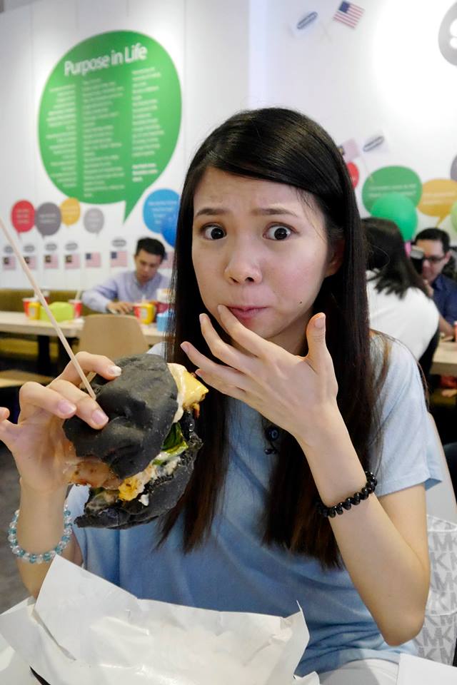 Mei Sze enjoying her burger