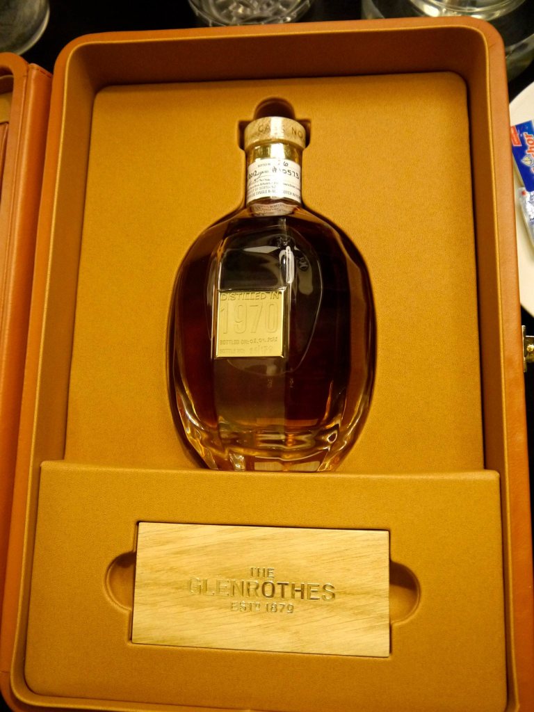 The materials used in the packaging of The Glenrothes Single Cask 1970 #10573 are kept to a minimum, using only crystal glass, brass, leather and oak. However you can’t help but be awed by the bottle’s beautiful yet simple design form and the high level of craftsmanship. Featuring the distinctive egg-shape of the Glenrothes whisky decanter, the bottle is created by a master craftsman in Portugal using hand-blown pure lead crystal, and a plaque made of polished brass is applied to just one front facet: engraved with the year of distillation and the bottle number to ensure the uniqueness and authenticity of each individual decanter. A hand-signed label by the Malt Master, Gordon Motion, is positioned around the neck of the decanter which is encased in a solid Scottish oak plinth in a fine hand-crafted leather case ensuring that after you’re done drinking the contents the bottle with its timeless elegance will make one heck of a prized masterpiece on your display shelf.
