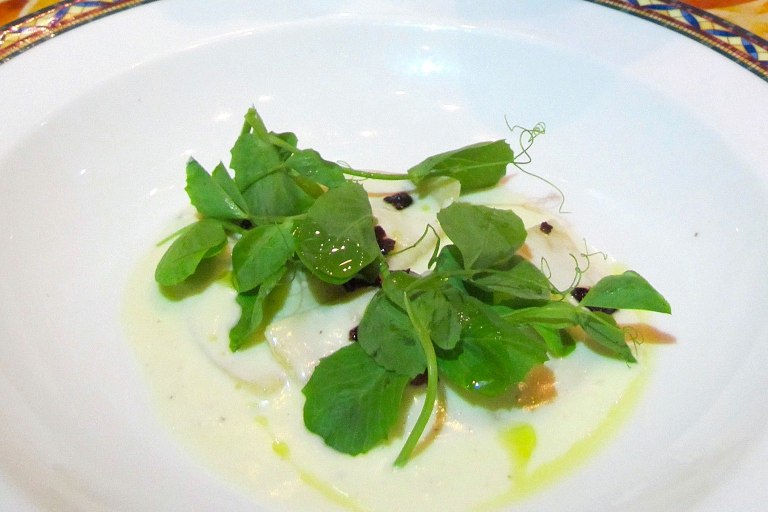 Pasta Ravioli di patate e mascarpone alla `Gricia `con prosciutto stagionato di manzo croccante Potato and Mascarpone Ravioli with Light Pepper Goat Cheese Fondue and Crispy Cured Beef Ham 