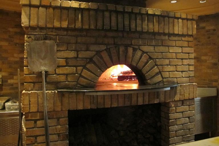 The restaurant has an open kitchen where you can watch the chefs prepare your food however it was the wood fire oven which is used to bake the pizzas which really caught my eye.
