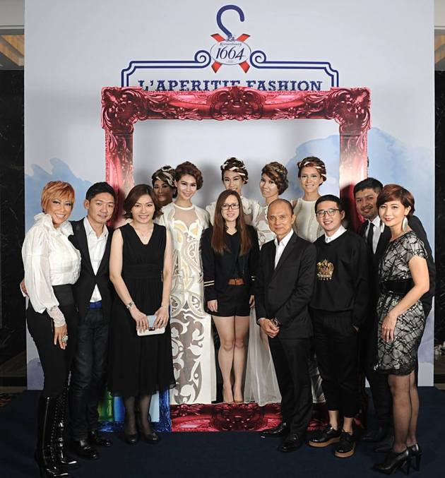 The winner with Dato Jimmy Choo, Juliet Yap the Marketing Director of Carlsberg Malaysia, and the judges
