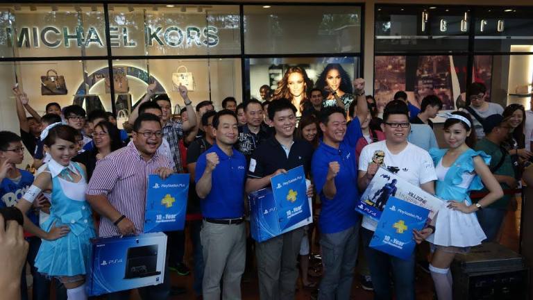 The happy smiles on first few in Malaysia to claim their sets!