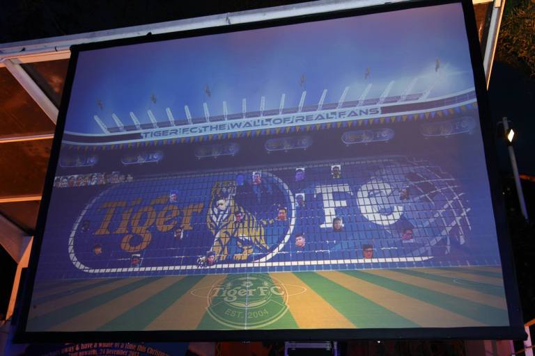 These photos were then uploaded to the giant Tiger FC "Wall of Real Fans"