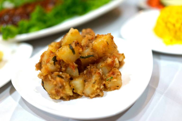 Brave Potatoes (cooked potatoes with tomato sauce)