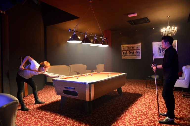 Wanna show off your pool skills or take a breather from the partying? Well there's a pool table for you to do just that.