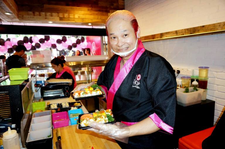 Despite working at a furious pace, Chef Yama still managed to pause, smile and pose for this shot.