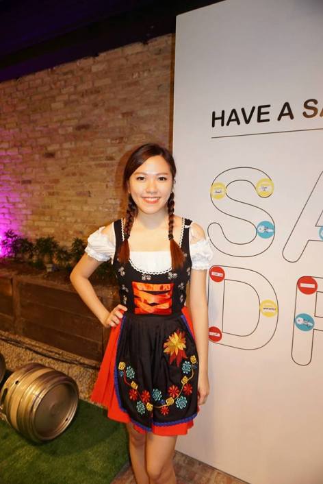 The pretty promoter girl managing the roll the beer barrel race game. I didn't partiipate as I was too full with all the German sausages and was afraid that they might inadvertently come out...