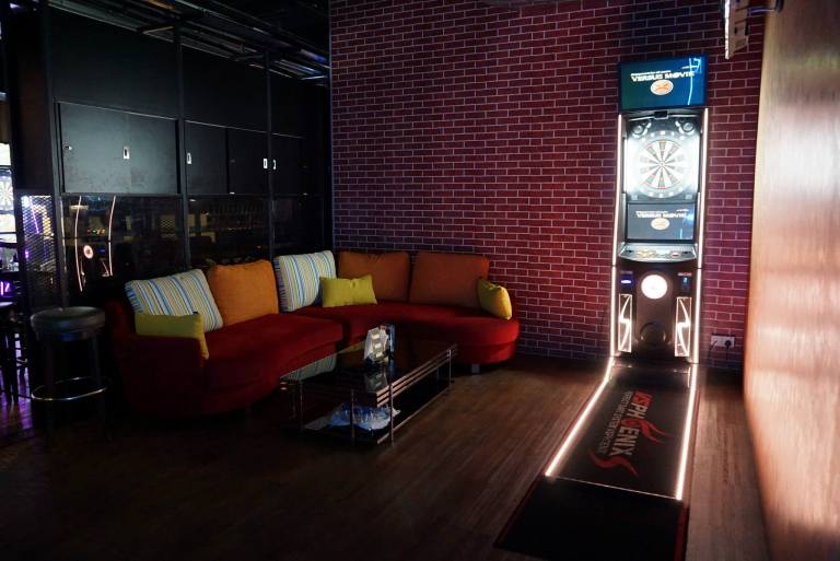 The outlet is mainly divided into 3 sections - the indoor sofa/ dining section, outdoor dining section and the darts/ bar section which has a private room with 2 machines and sofas (pictured here)