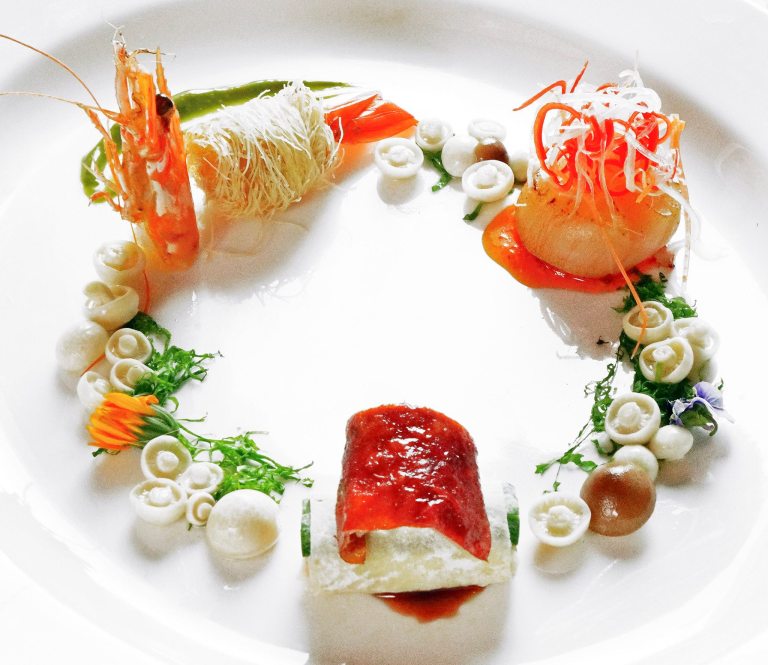 Pan-fried dragon beard prawn with green tea, stuffed Peking duck, seared Hokkaido scallop & mushroom blossom