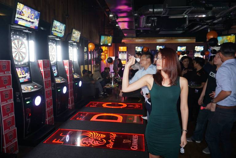 Meanwhile, some of the girls got addicted to playing darts inside the dart machines area