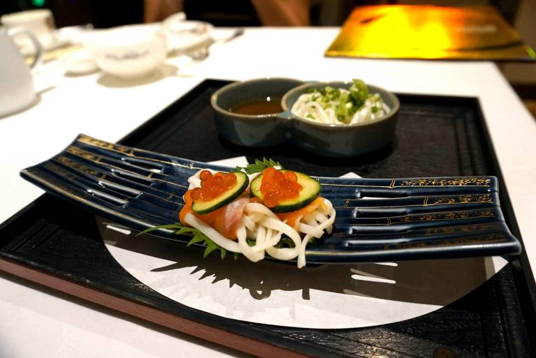 Salmon sashimi on cold inaniwa udon with ikura