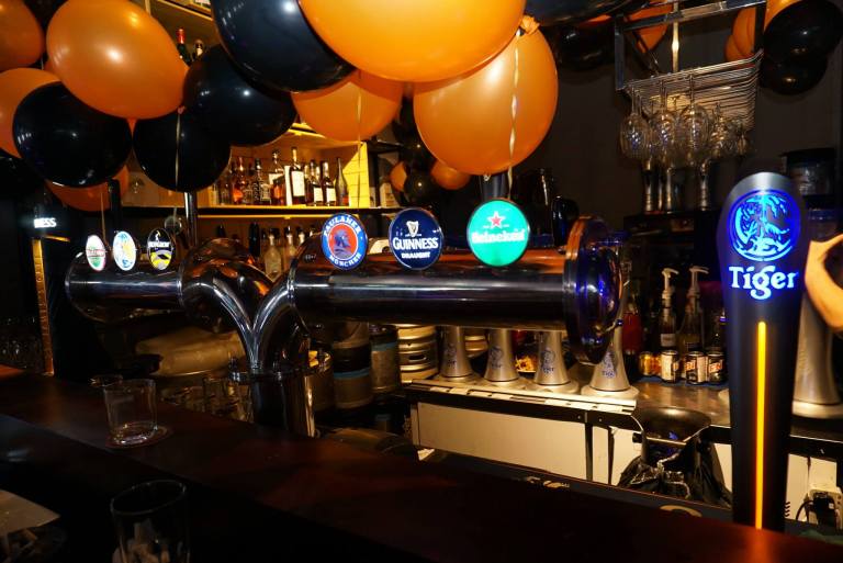 Speaking of drinks, the fully stocked bar at Friendscino has draught beers on tap as well as a selection of liquors and even champagne!