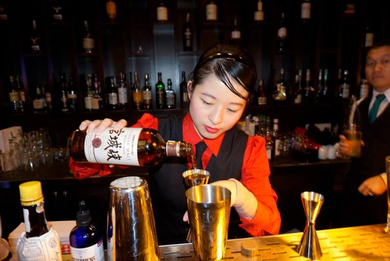 Making the cocktails were two of Marini's  on 57's top bartenders