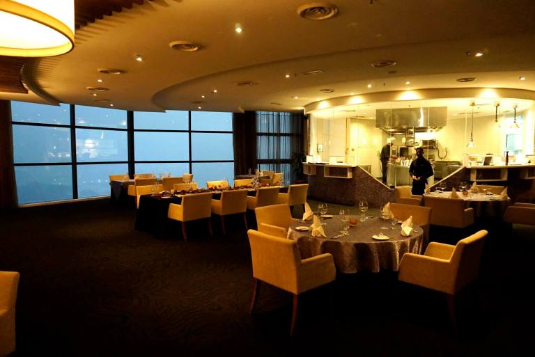 You get to watch the chefs work in the open kitchen and enjoy a view of the surrounding areas. As it was raining cats and dogs outside, sadly our view out the window was pretty much obscured that night.