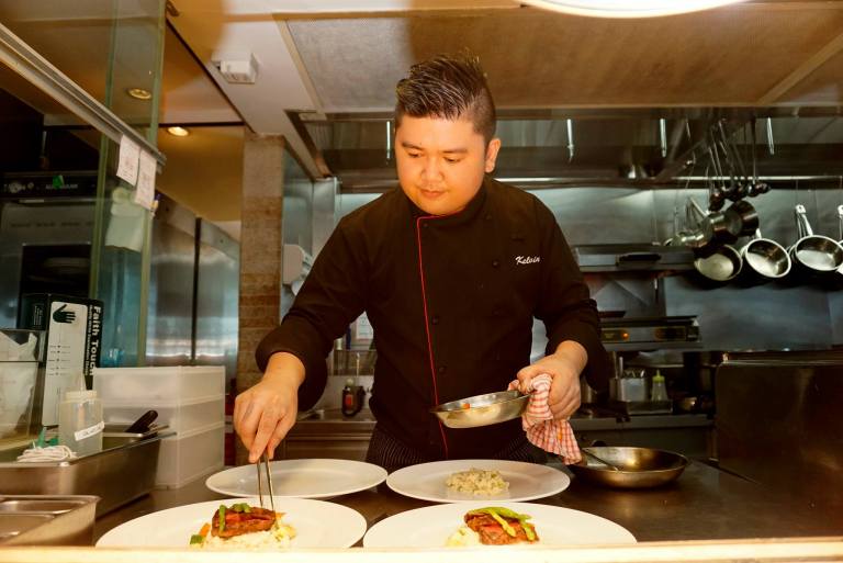 While I was helping myself to the starters I noticed the chef preparing our main courses