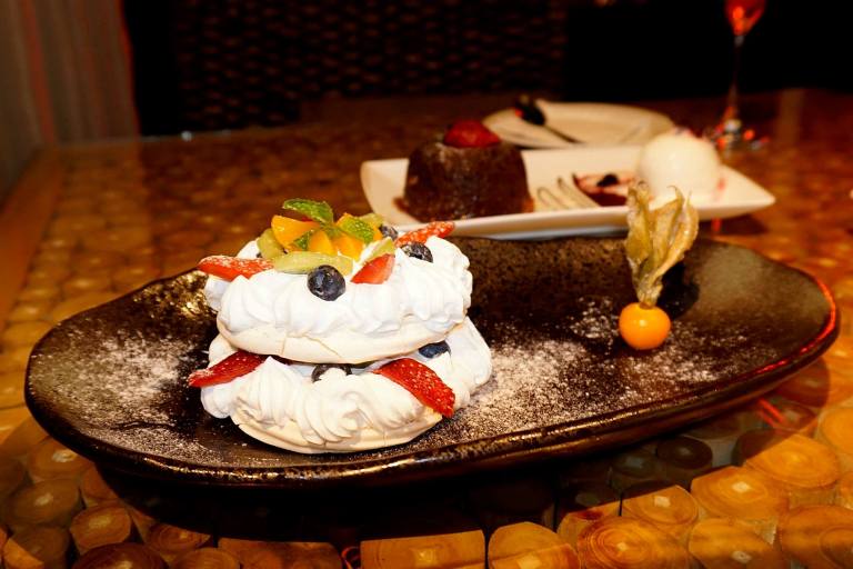 Pavlova – a meringue based dessert with a crisp crust and soft light filling inside