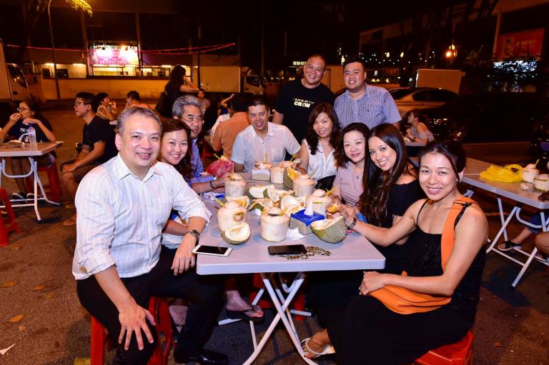 Customers enjoying the durians