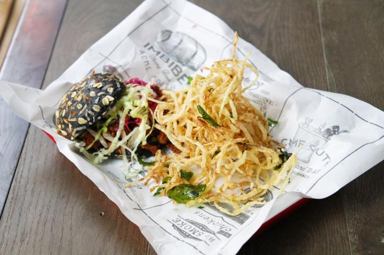 Sloppy Joe - A mouthwatering sloppy beef burger on own-made charcoal bread, pickled cabbage and onion string fries