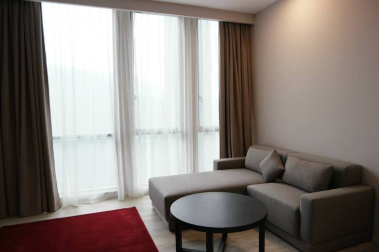 There was a nice sofa to lounge in while watching the many channels on the TV