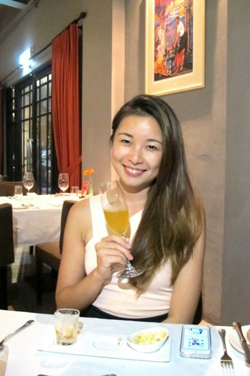 Michelle with the complimentary aperitif which comes with the canapes - Blood Orange Mimosa