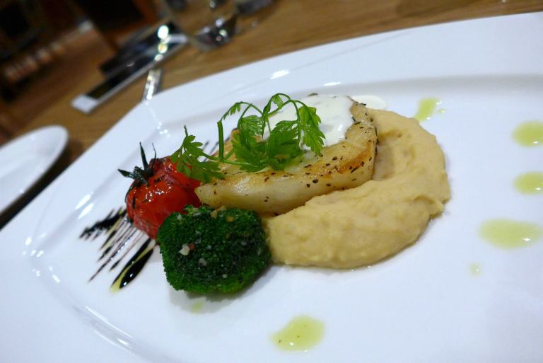 Pot Roasted Black Cod with Chickpeas Puree, Sun Blushed Tomato in Vine and Lemon Thyme Veloute