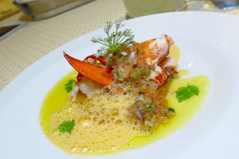 Poached Boston Lobster Salad on Grilled Mango with Truffle Oil