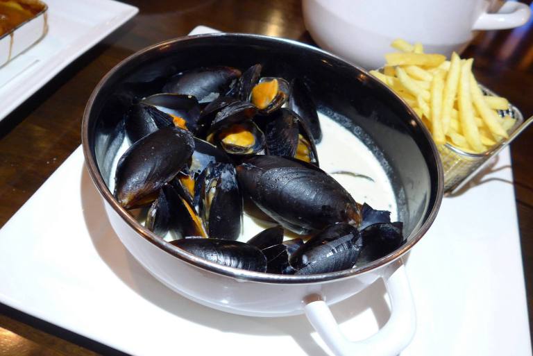 Mussels served with creamy white wine sauce and french fries - RM42.00