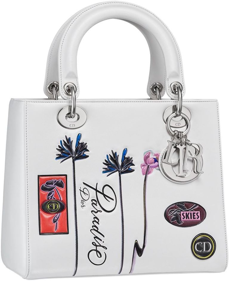 Lady Dior bag in white paradise calfskin, badges and flowers in embossed leather, large strap