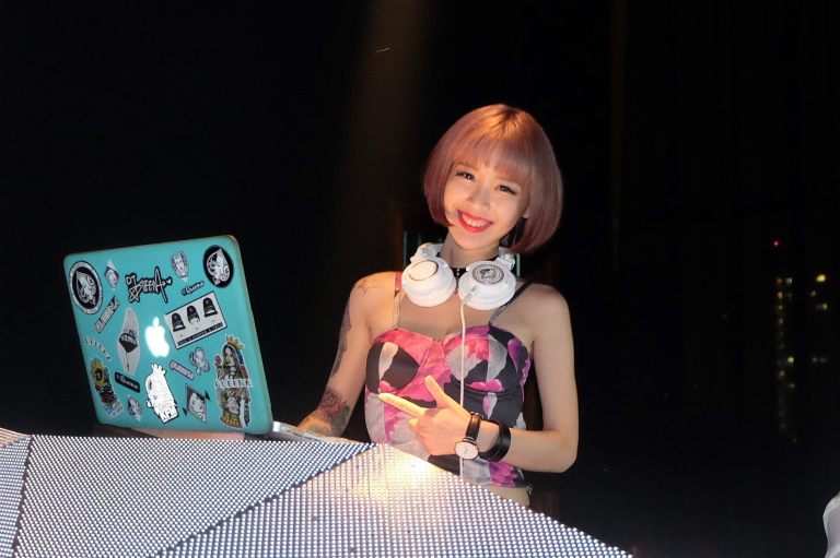 The cute DJ Queena on the decks at Ruyi & Lyn's NYE countdown party