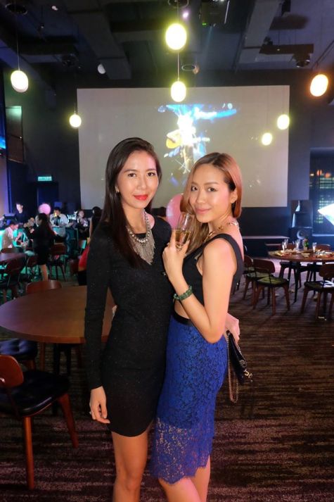Former runway models June Yap and Brigette Yu (L-R)