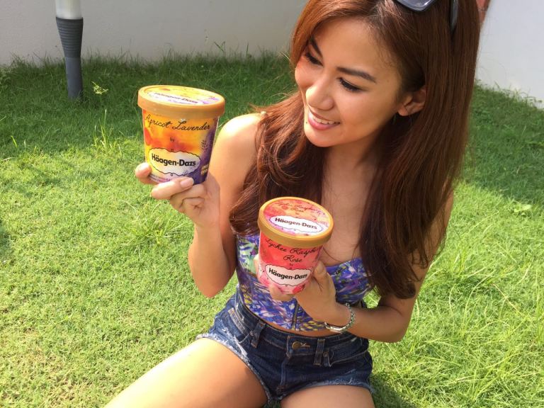 Lee Yvonne enjoying her Haagen Dazs ice cream on a hot day