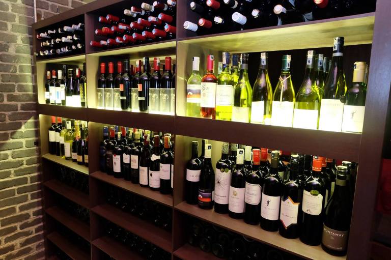 The wine racks which offer a selection of reds, whites, sparklings and champagnes