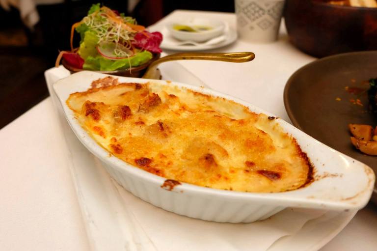 Baccala Al Forno - RM88.00 - Cod fish "Bacalla" with potato & onion gratin with parmigiano cheese