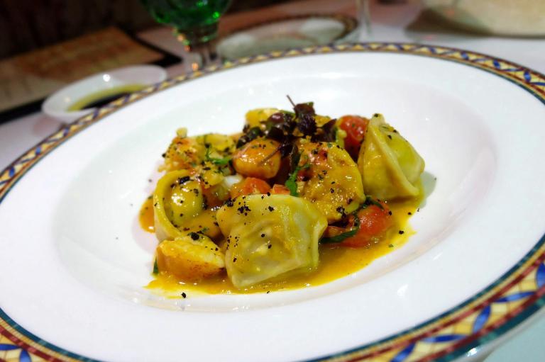 Tortelloni di finferli Chanterelle tortellini with pumpkins cream, confit half lobster and sauté artichoke - RM170.00
