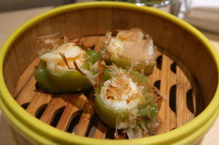 Emerald dumpling topped with fresh scallop - her favourite dish!