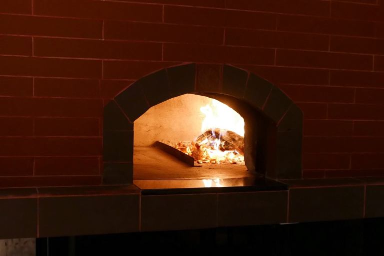 The interior of the restaurant wasn't changed much except the addition of a wood fire oven which is primarily for baking the pizzas