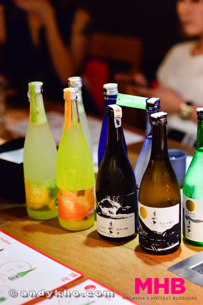 Awaiting us at the table were various bottles of sake